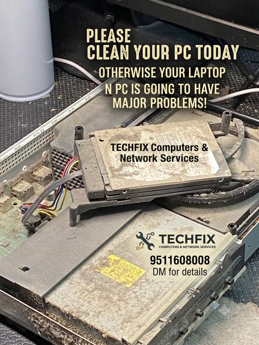 Technician inspecting a laptop and computer components